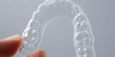 Centra Dental - Pros and Cons of Clear Retainers After Houston Braces Treatment